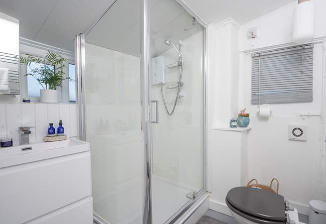 Please note the shower height is low in the bathroom.