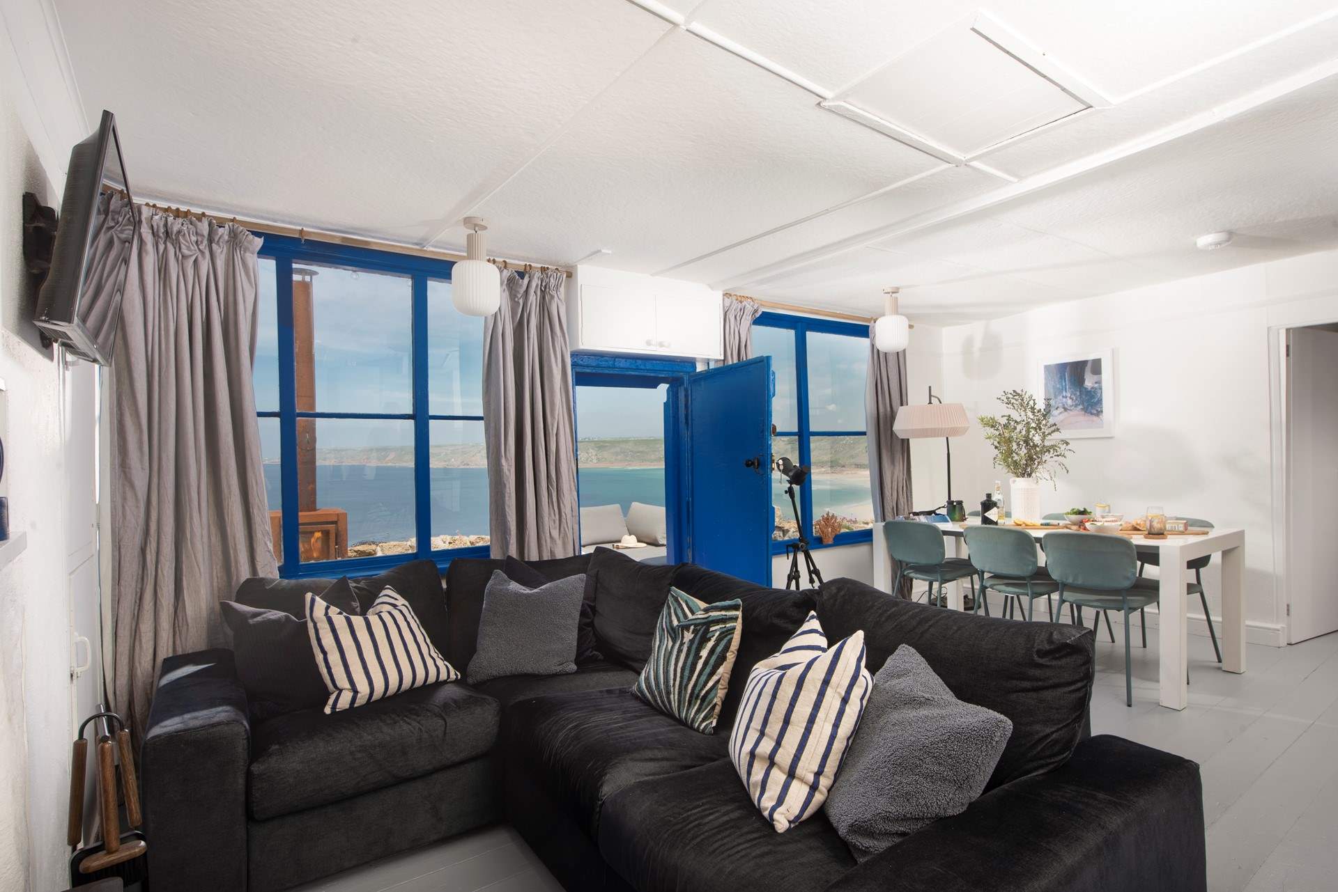 A sumptuous sofa to sink into after a day by the Cornish sea.