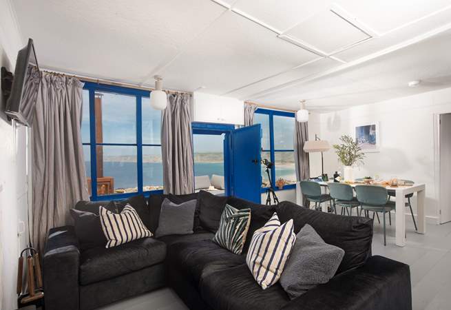 A sumptuous sofa to sink into after a day by the Cornish sea.