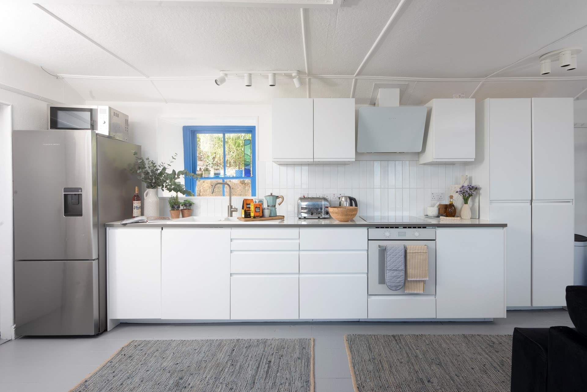 A luxury modern kitchen in the open plan living area, perfect to cook up a feast.