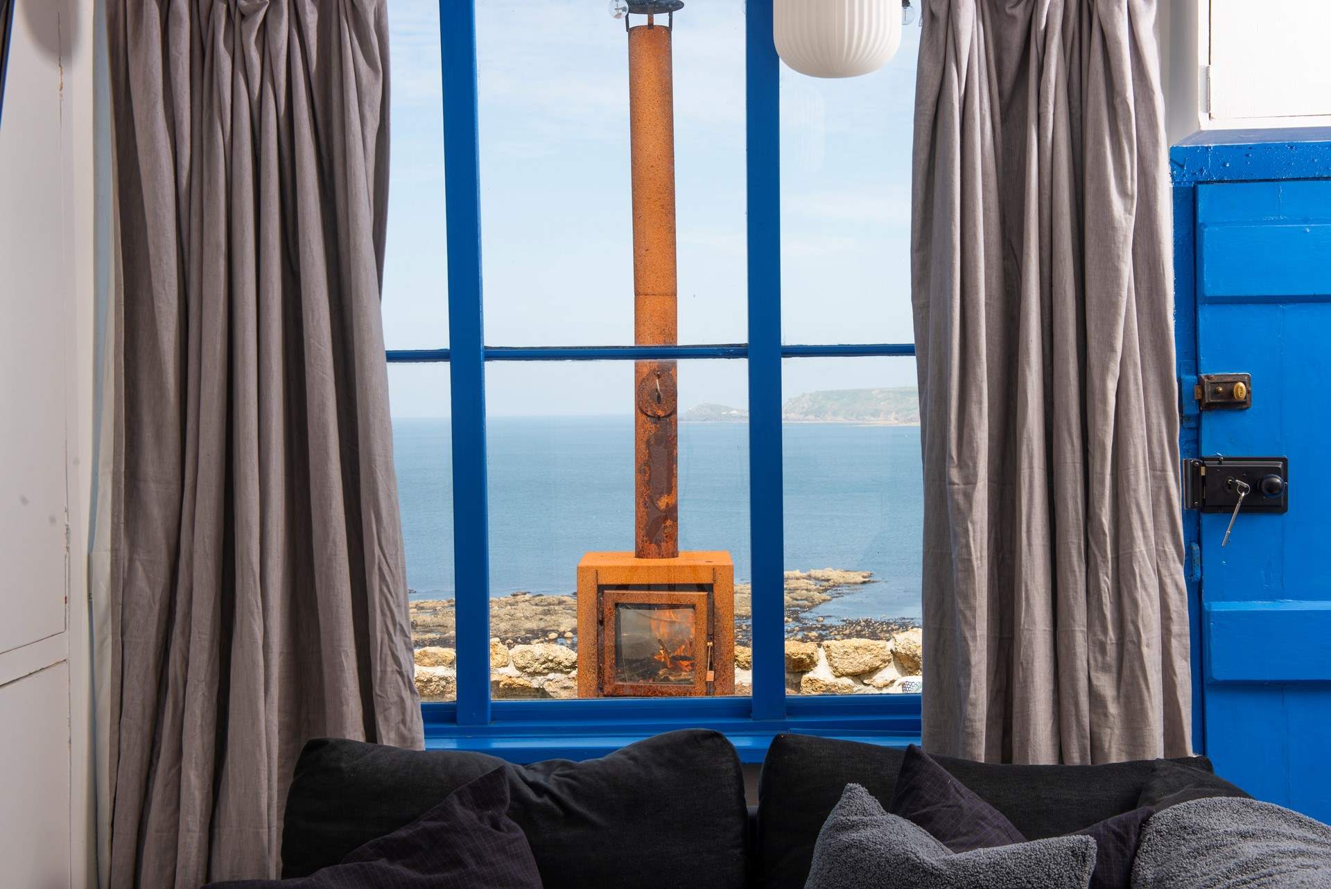 The rustic firepit standing tall against a truly remarkable backdrop.