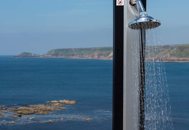 An outdoor shower to wash away the salty day.