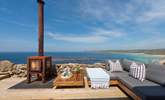 Relax on the terrace at the front of this beautiful cottage. - Thumbnail Image