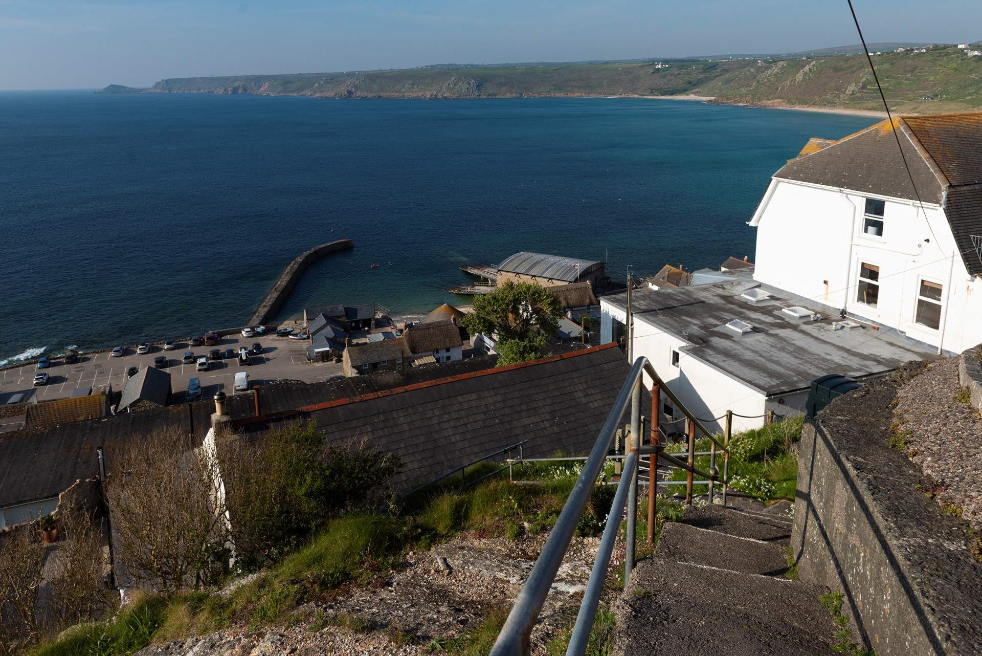 There are 26 steps down to this beautiful cottage, the path then leads down to the beach.