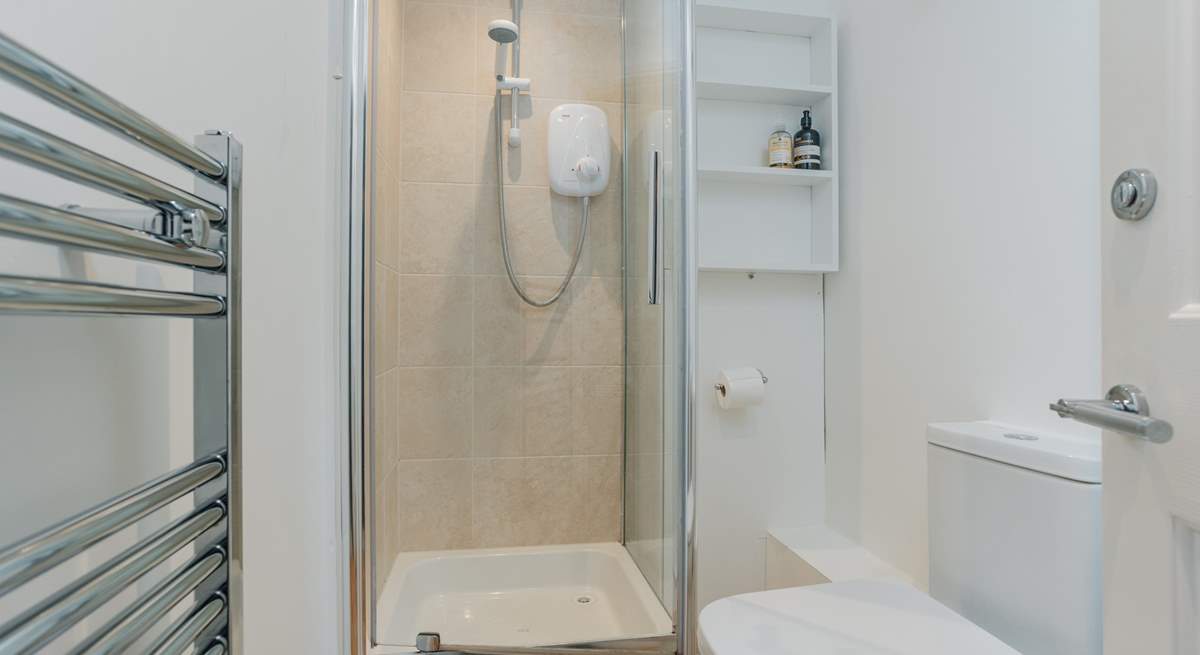 The en suite shower-room is bright and modern.