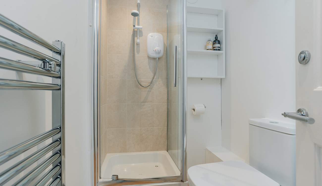 The en suite shower-room is bright and modern.