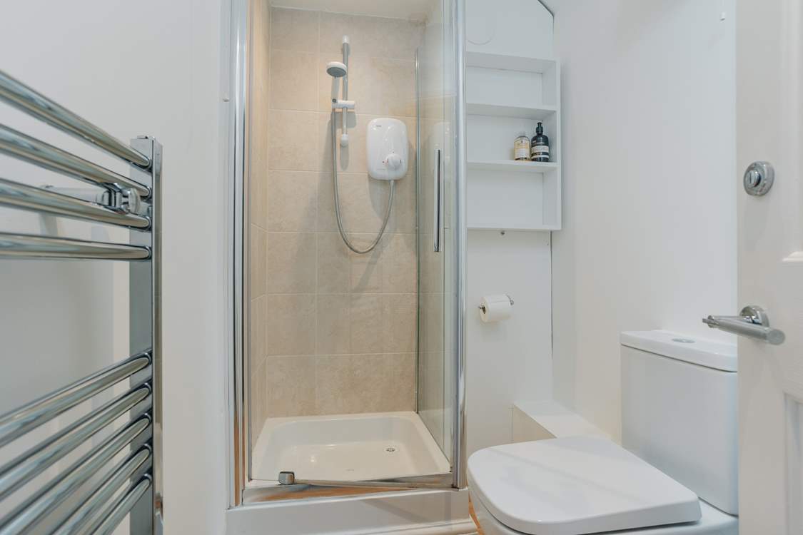 The en suite shower-room is bright and modern.