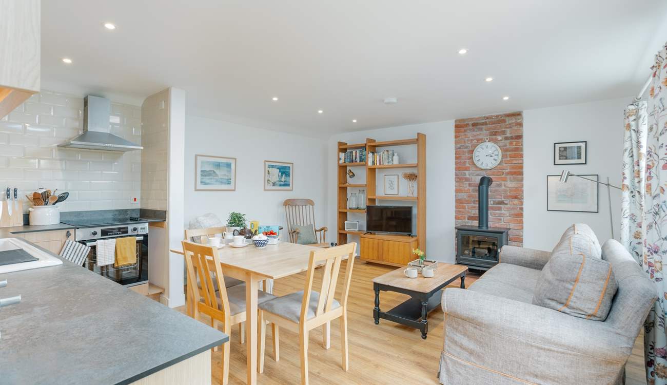 The open plan living and kitchen area is wonderful for socialising.