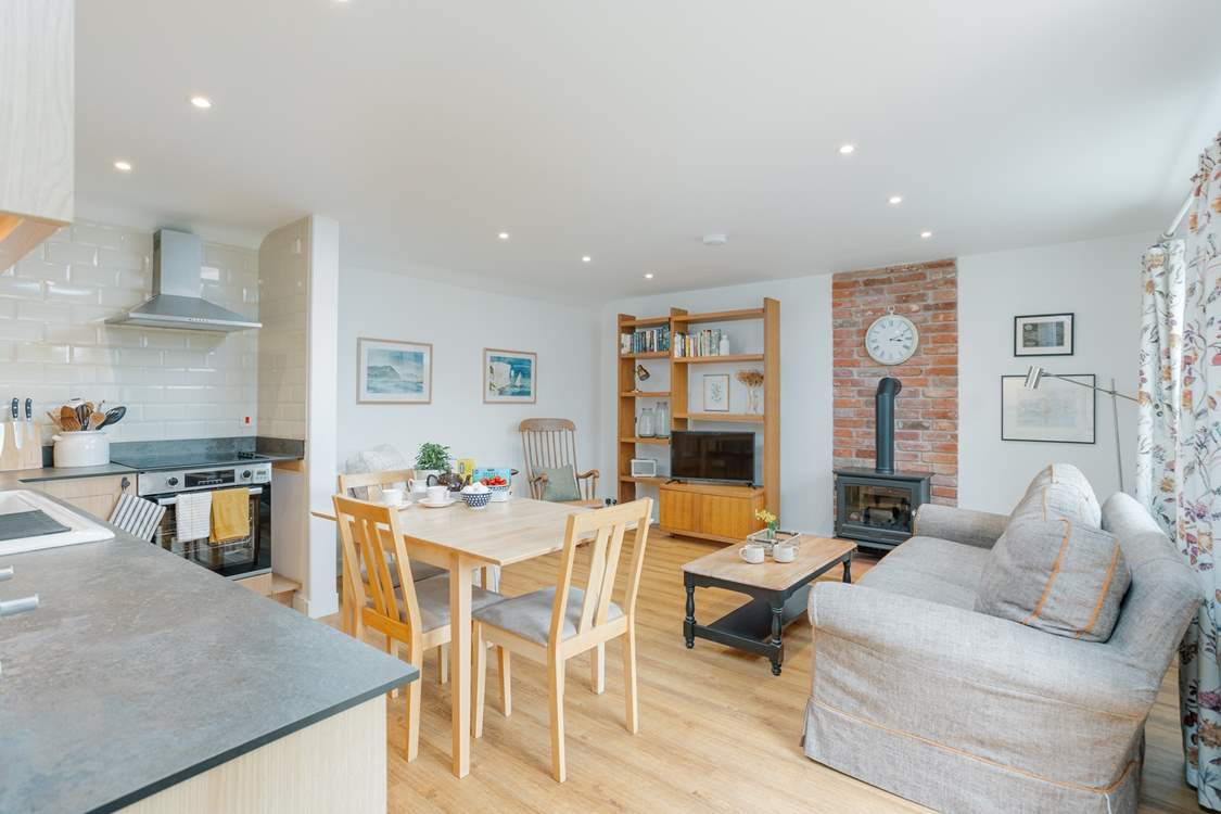 The open plan living and kitchen area is wonderful for socialising.