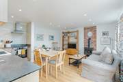 The open plan living and kitchen area is wonderful for socialising.