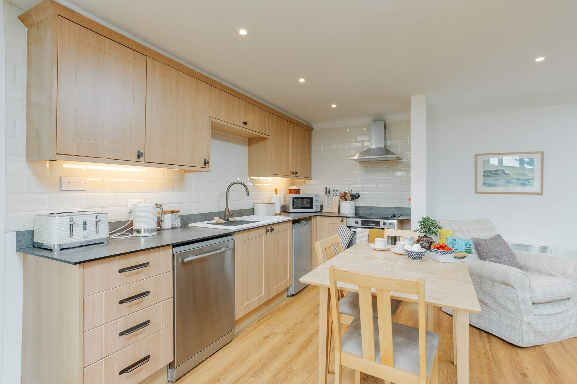 The Dairy features a wonderfully sociable open plan kitchen and living space, all connected via French doors to the terrace.