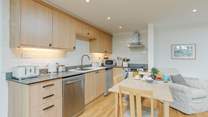 The Dairy features a wonderfully sociable open plan kitchen and living space, all connected via French doors to the terrace.