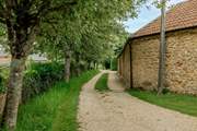 A shot of the driveway that is well maintained.