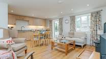 The open plan kitchen and living space is very spacious and perfect for social times.