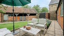 Your private garden is a peaceful spot. (The buildings opposite are empty and not accessed by anyone.)