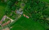 Looking from above - The Granary is the property next to the one with solar panels and the woodland is on the right hand side of the photo, beyond the owners' home. - Thumbnail Image