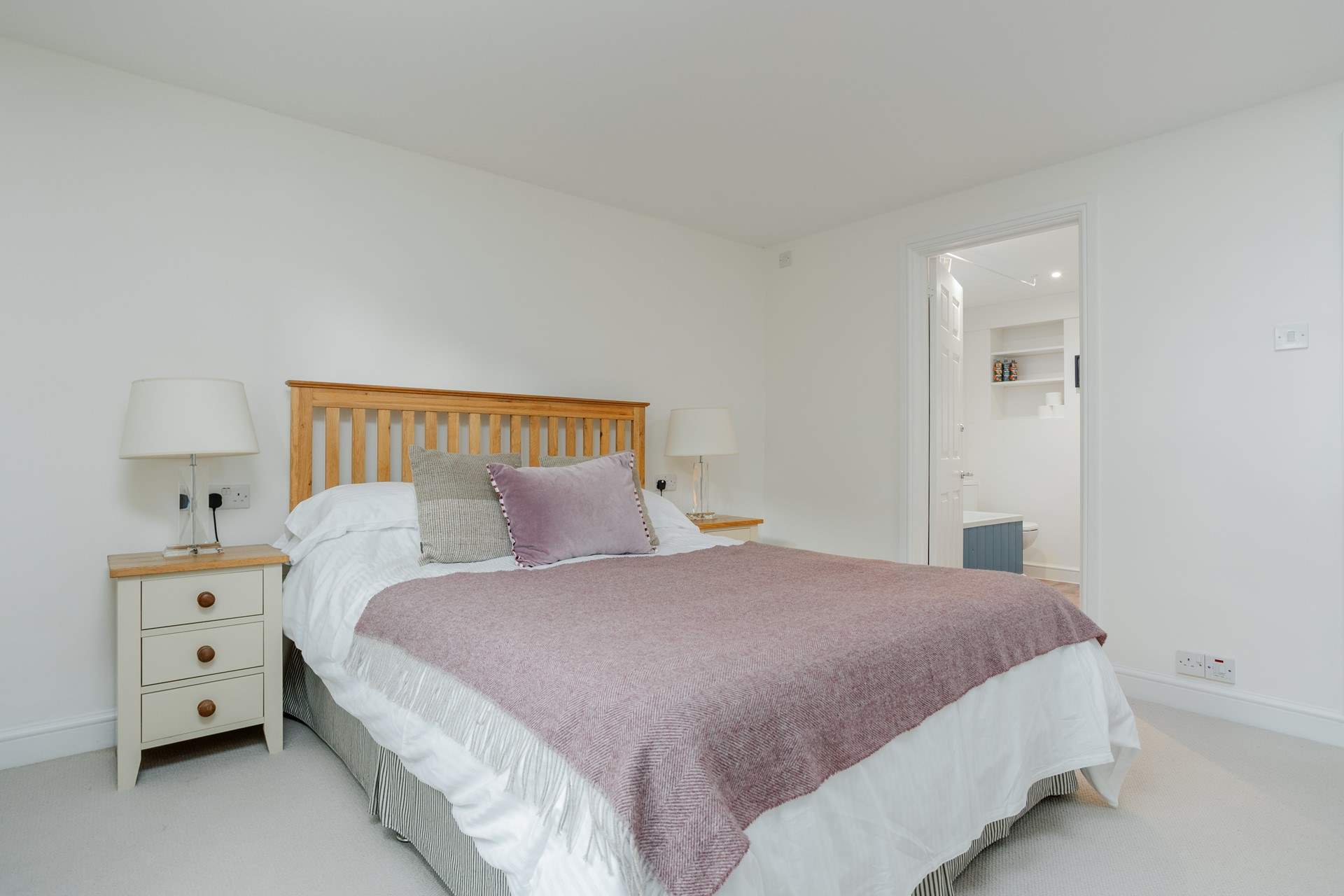 Peeking through to the en suite bathroom.