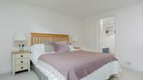 The very spacious primary bedroom has a wonderful en-suite bathroom and shower.