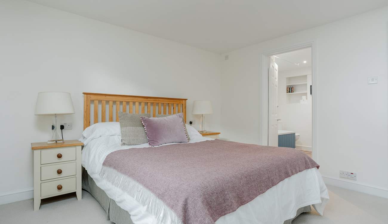 Peeking through to the en suite bathroom.