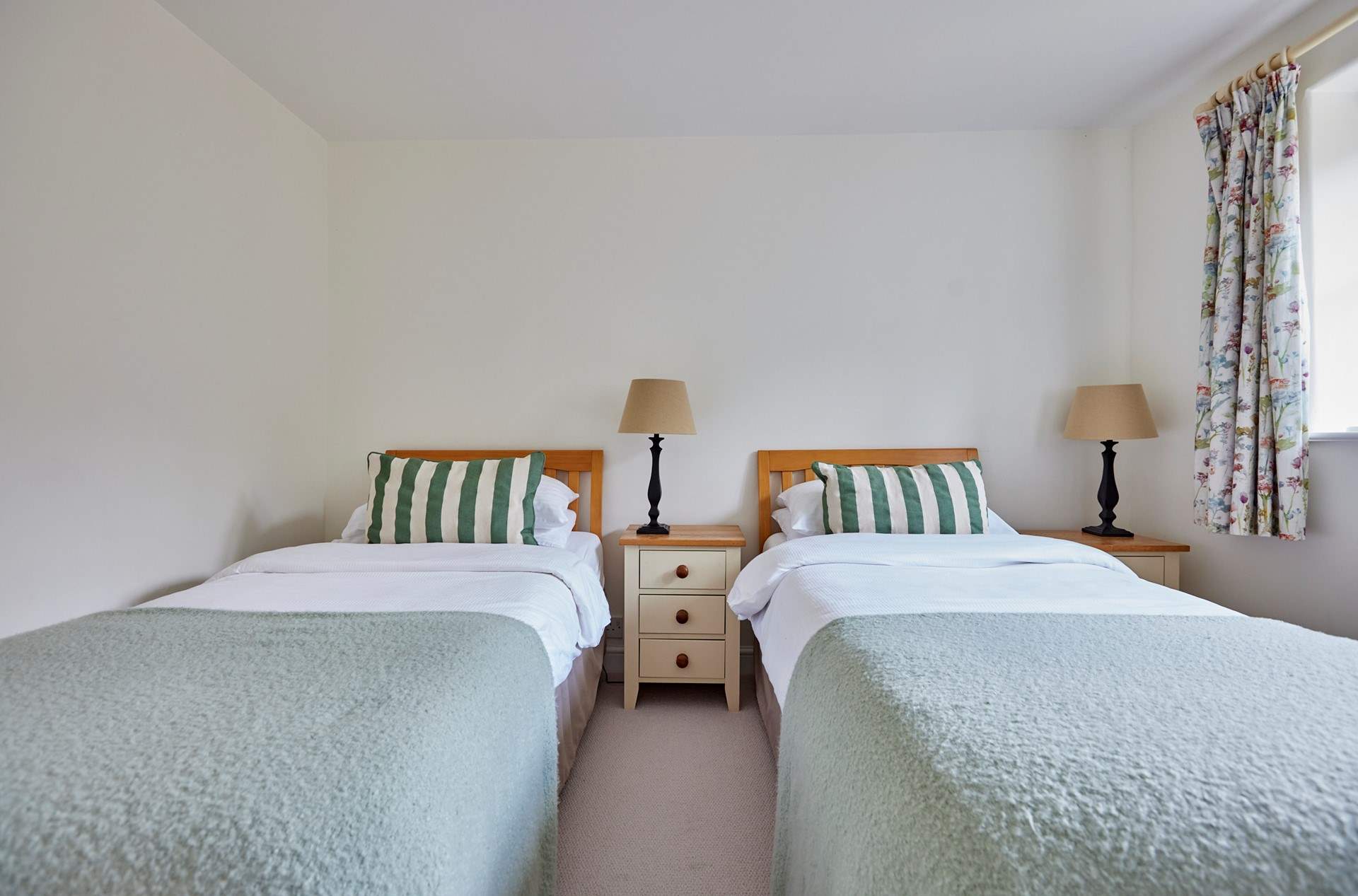 Bedroom two offers twin beds which gives great flexibility for children and adults alike. A spacious wardrobe can also be found in here.
