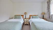 Bedroom two offers twin beds which gives great flexibility for children and adults alike. A spacious wardrobe can also be found in here.