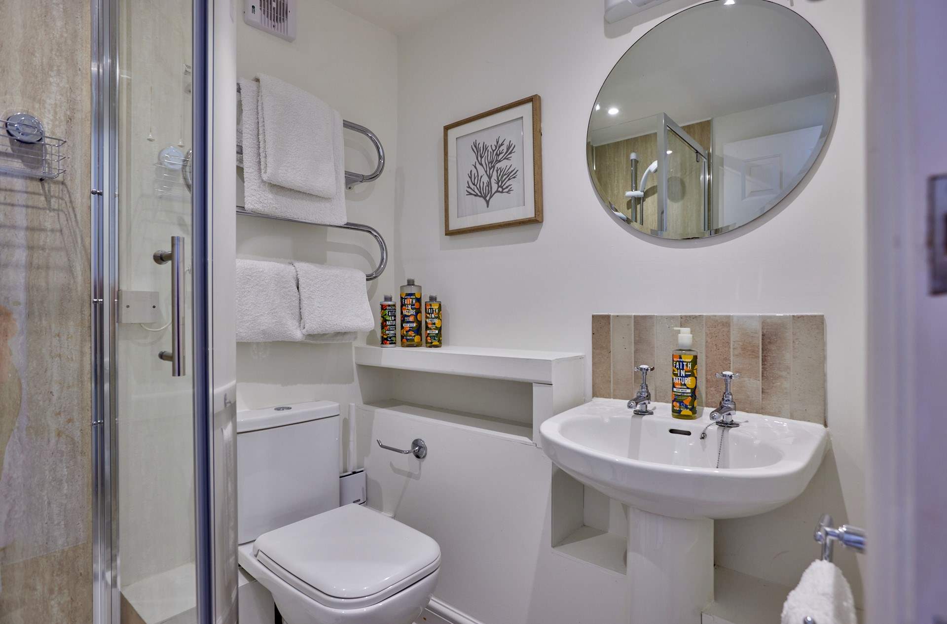A peek at the lovely shower room to compliment the en-suite bathroom.
