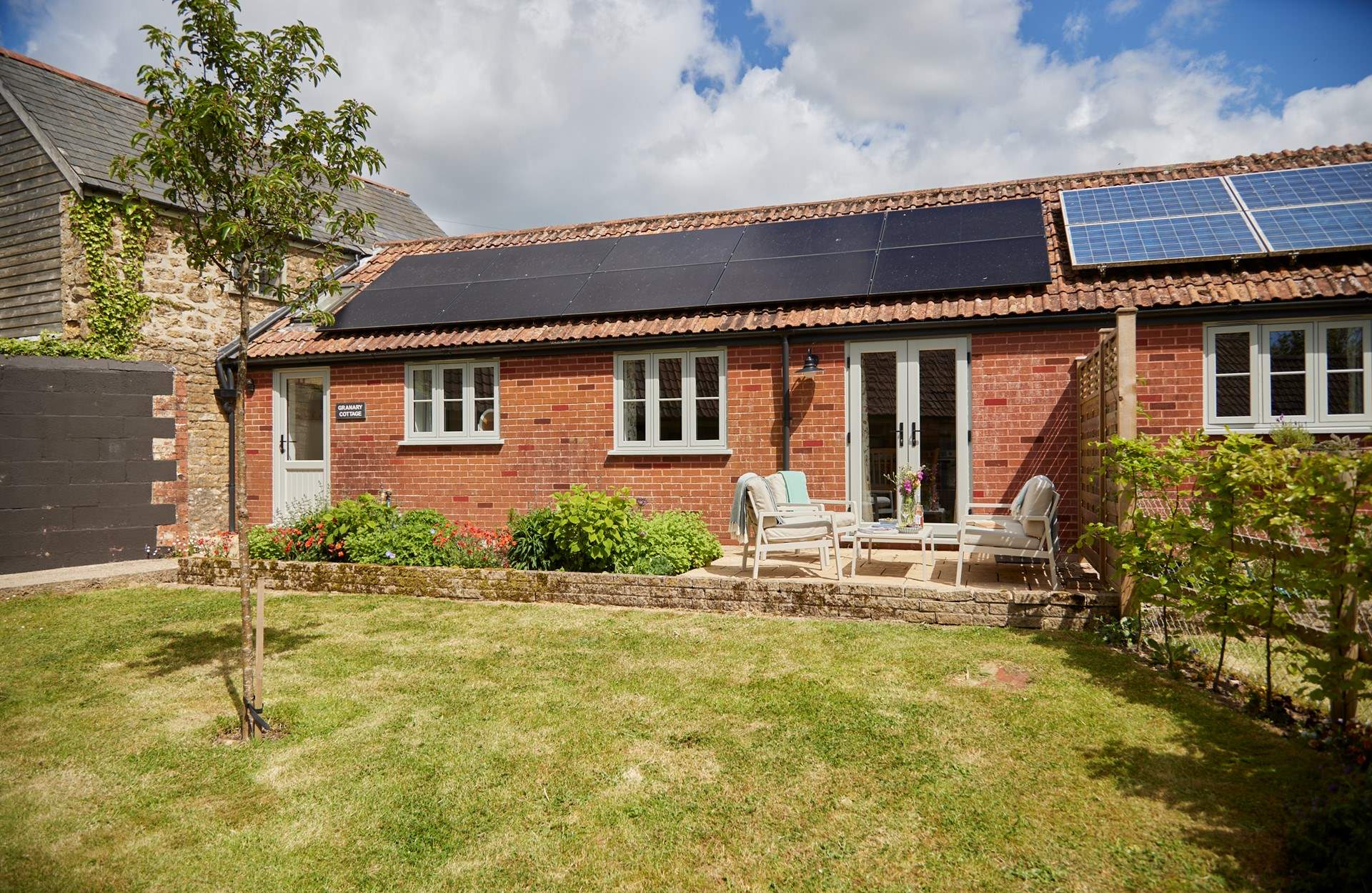 The garden at The Granary is a real treat. Carefully landscaped you have a wonderful lawn space and a lovely terrace with double doors from the main living area.