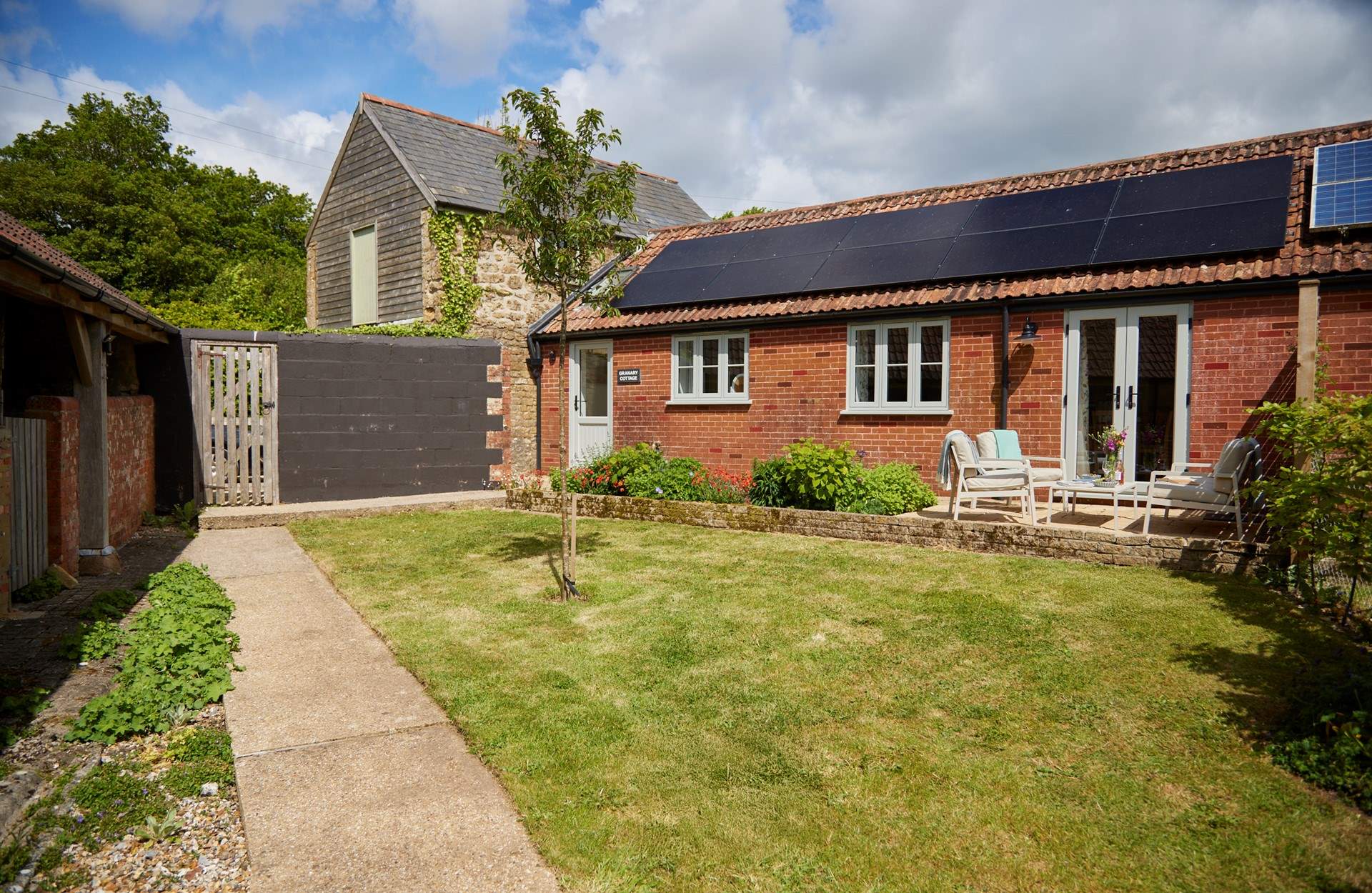 The garden at The Granary is a real treat. Carefully landscaped you have a wonderful lawn space and a lovely terrace with double doors from the main living area.