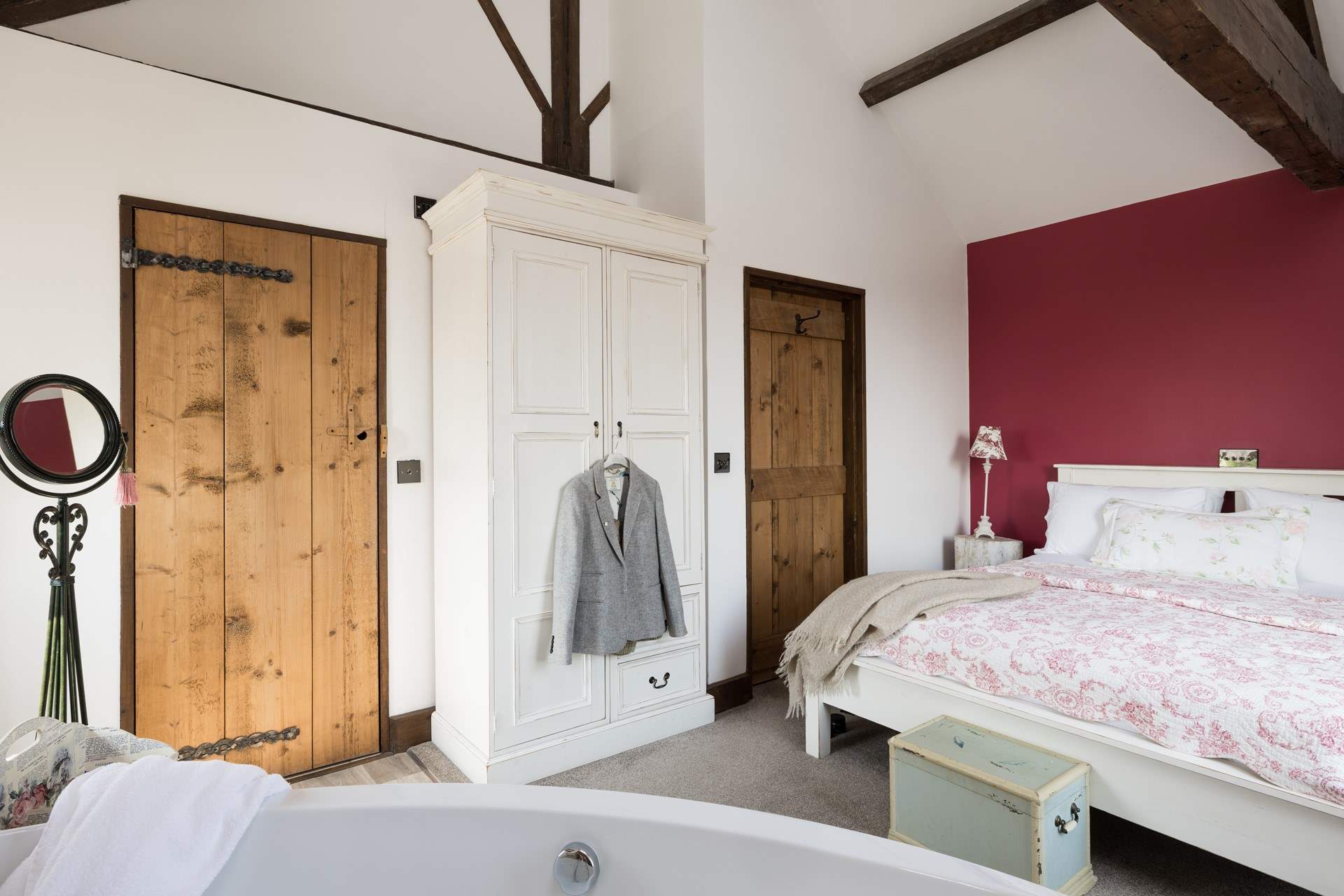 The beams and vaulted ceiling are a beautiful feature of bedroom 3.