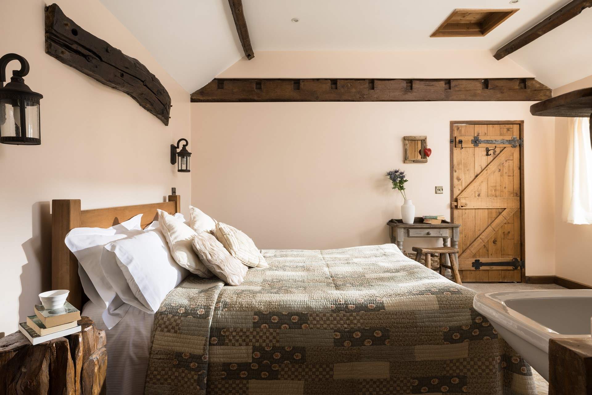 The sun streams into this delightful king-size bedroom.