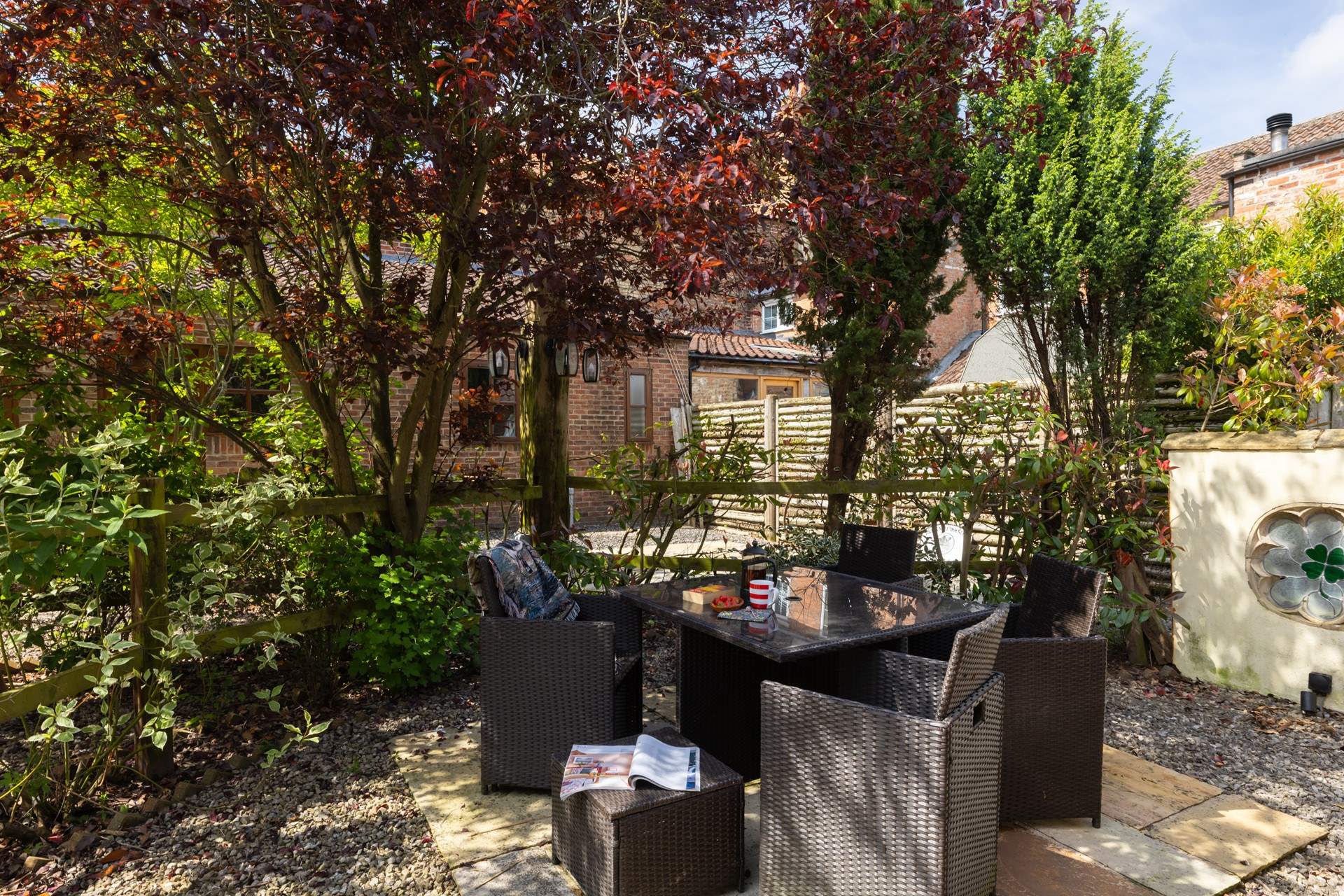 Dappled sunlight over the patio.