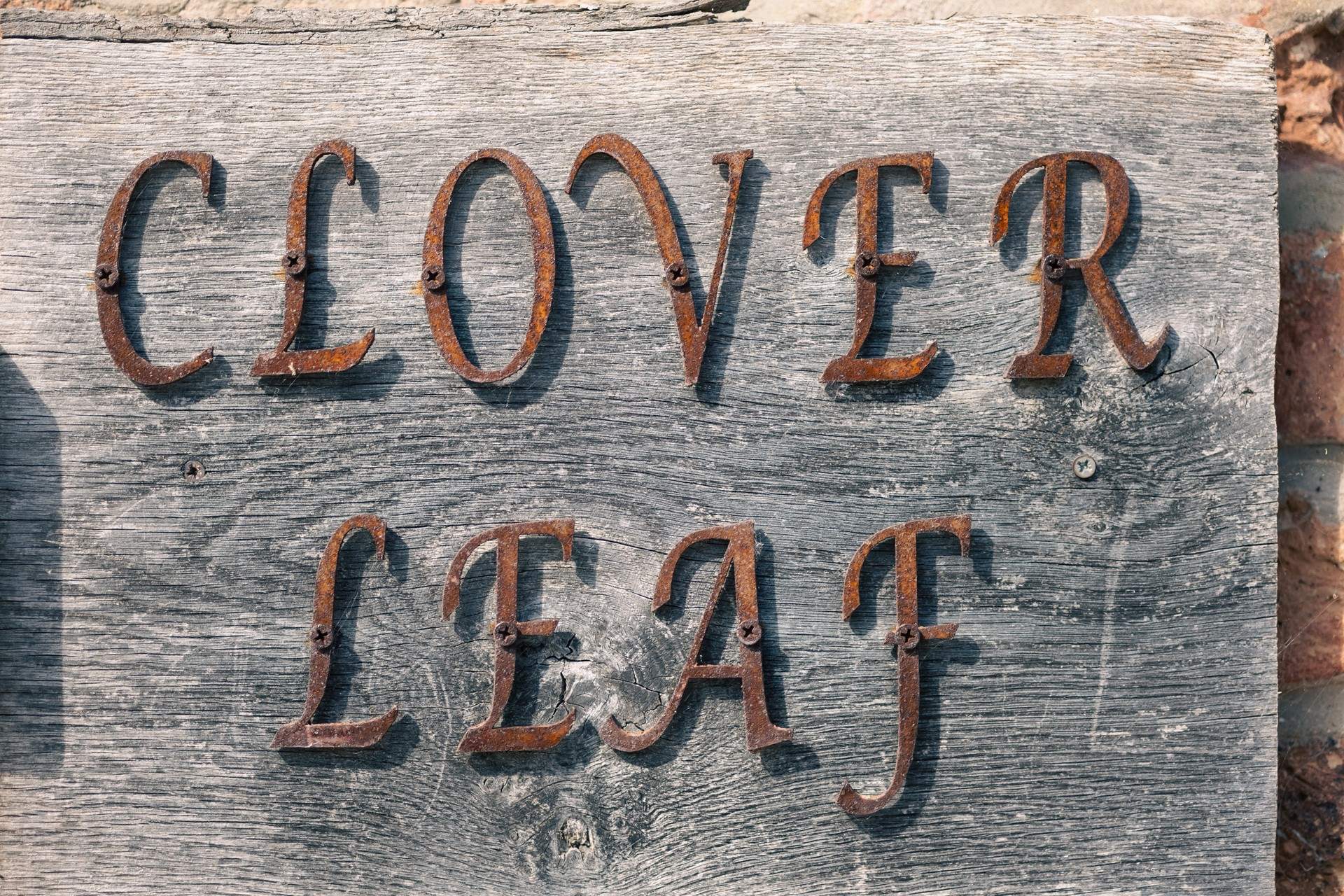 Spot the metal clover leaves dotted around the cottage .