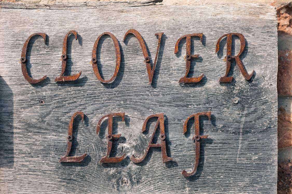 Spot the metal clover leaves dotted around the cottage .