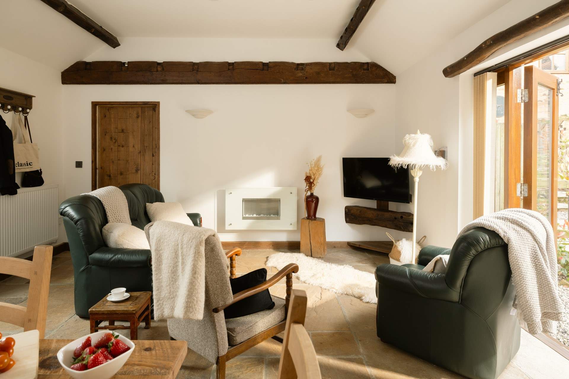 The beams give a hint to the cottage's history as a farm building.