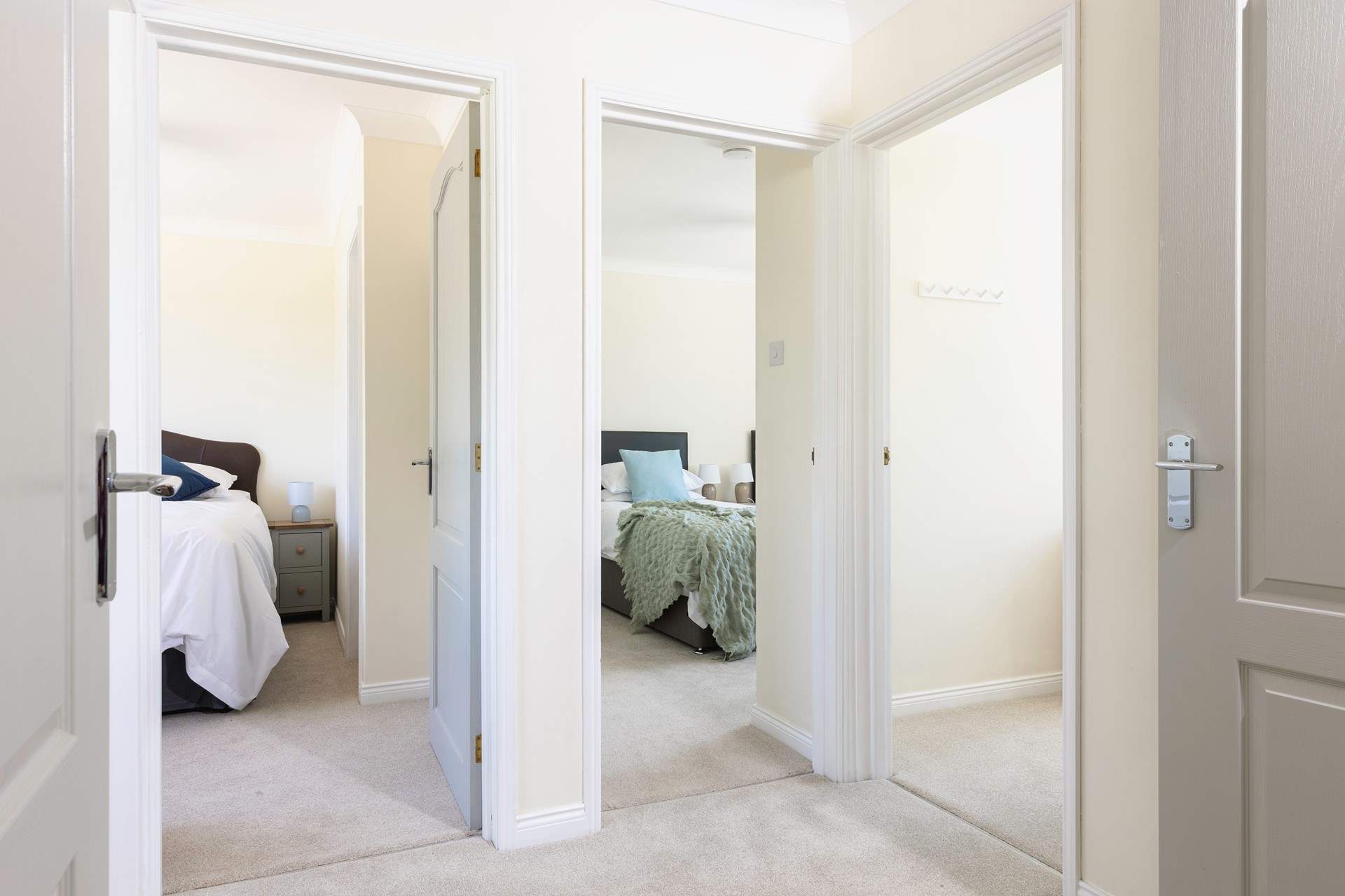 Off the hallway are the three bedrooms.