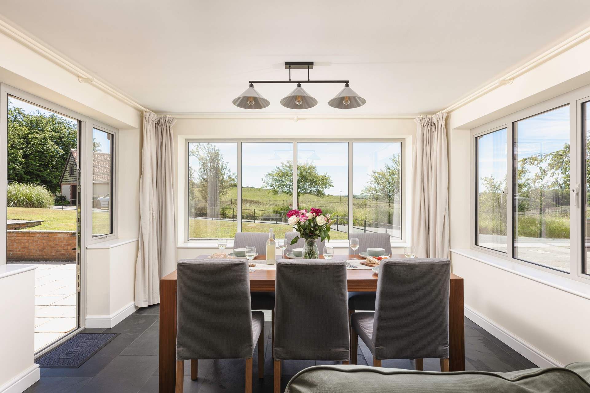 Soak up the light streaming in, whilst enjoying a leisurely breakfast in the dining-area.