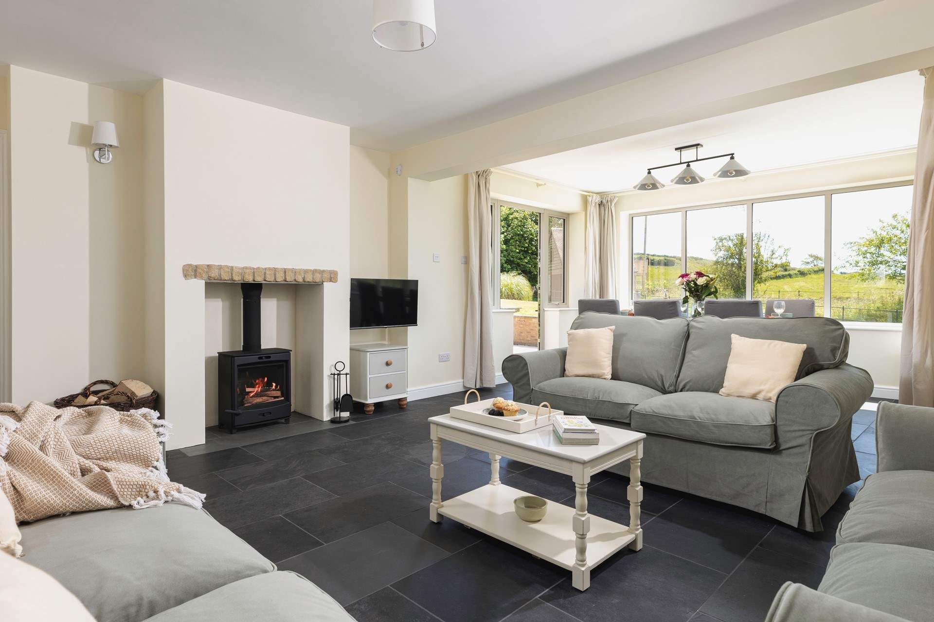 The spacious sitting/dining-room is the perfect place to just sit back and relax.