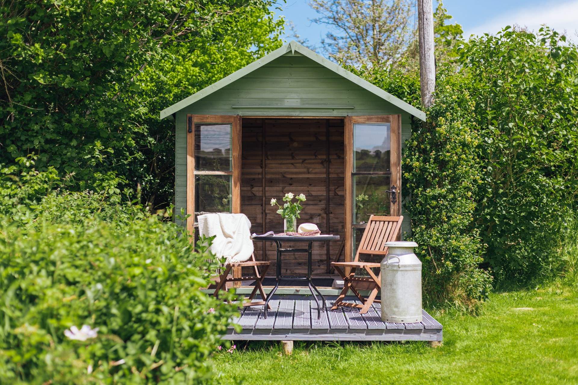 A nice little sun-trap or the most beautiful spot to hide from the good old English weather and still take in the far reaching view!
