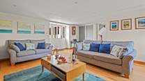 Step through the front door and into the living-room.