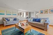 Step through the front door and into the living-room.