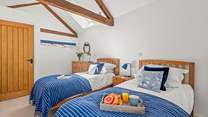 The vaulted ceilings make this delightful room spacious and airy.