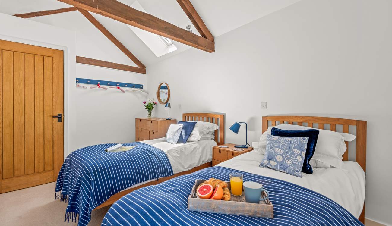 The vaulted ceilings make this delightful room spacious and airy.