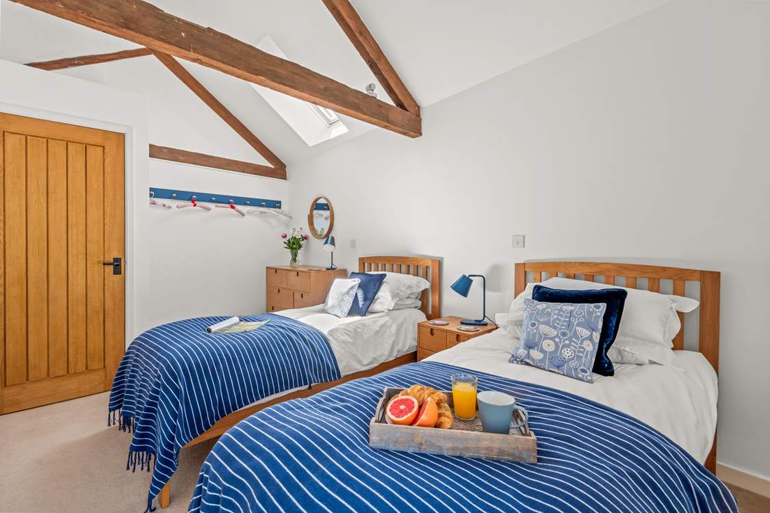 The vaulted ceilings make this delightful room spacious and airy.