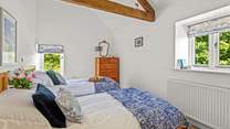 Bedroom 4 offers this beautiful twin configuration.
