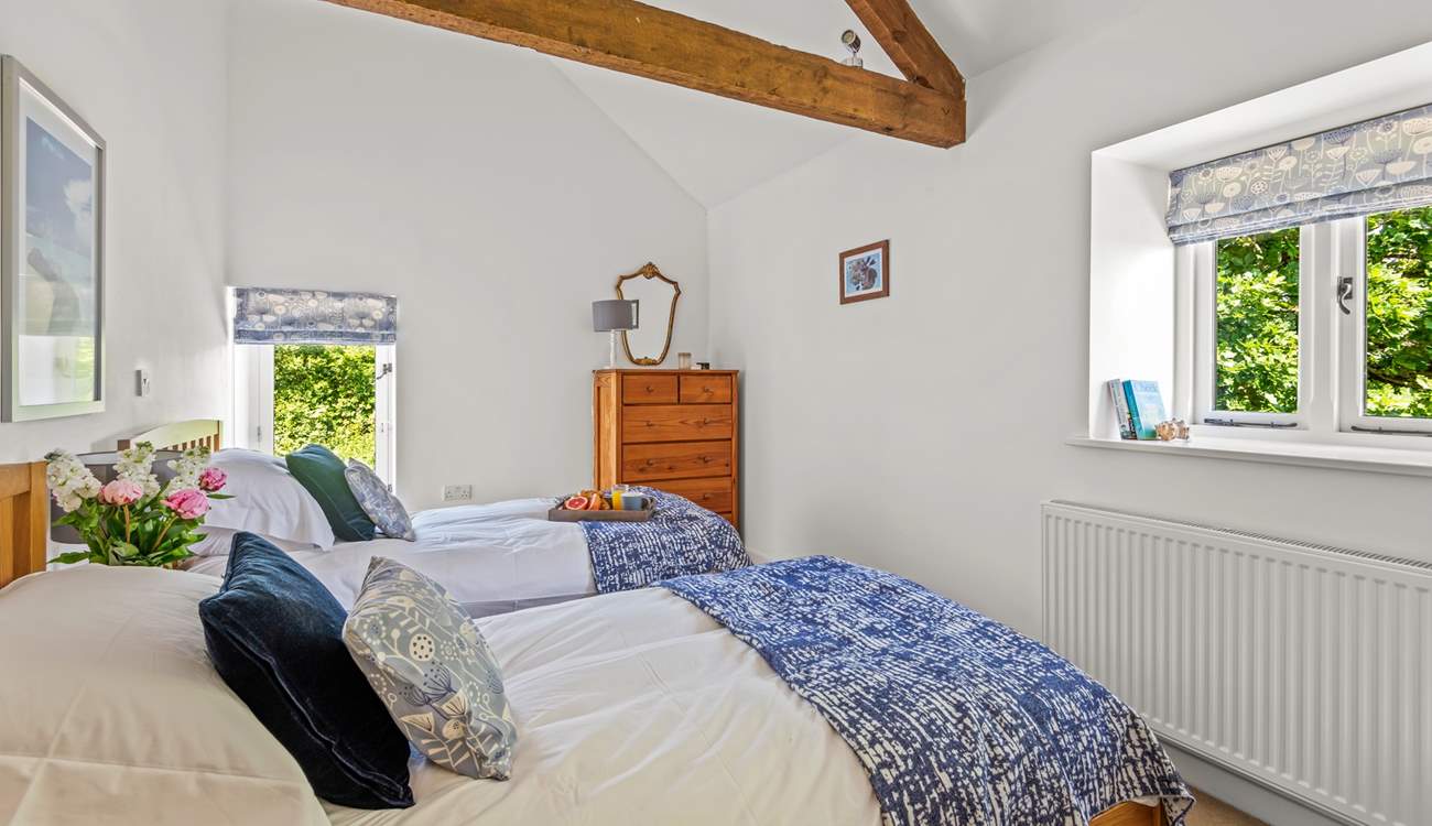 Bedroom 4 offers this beautiful twin configuration.