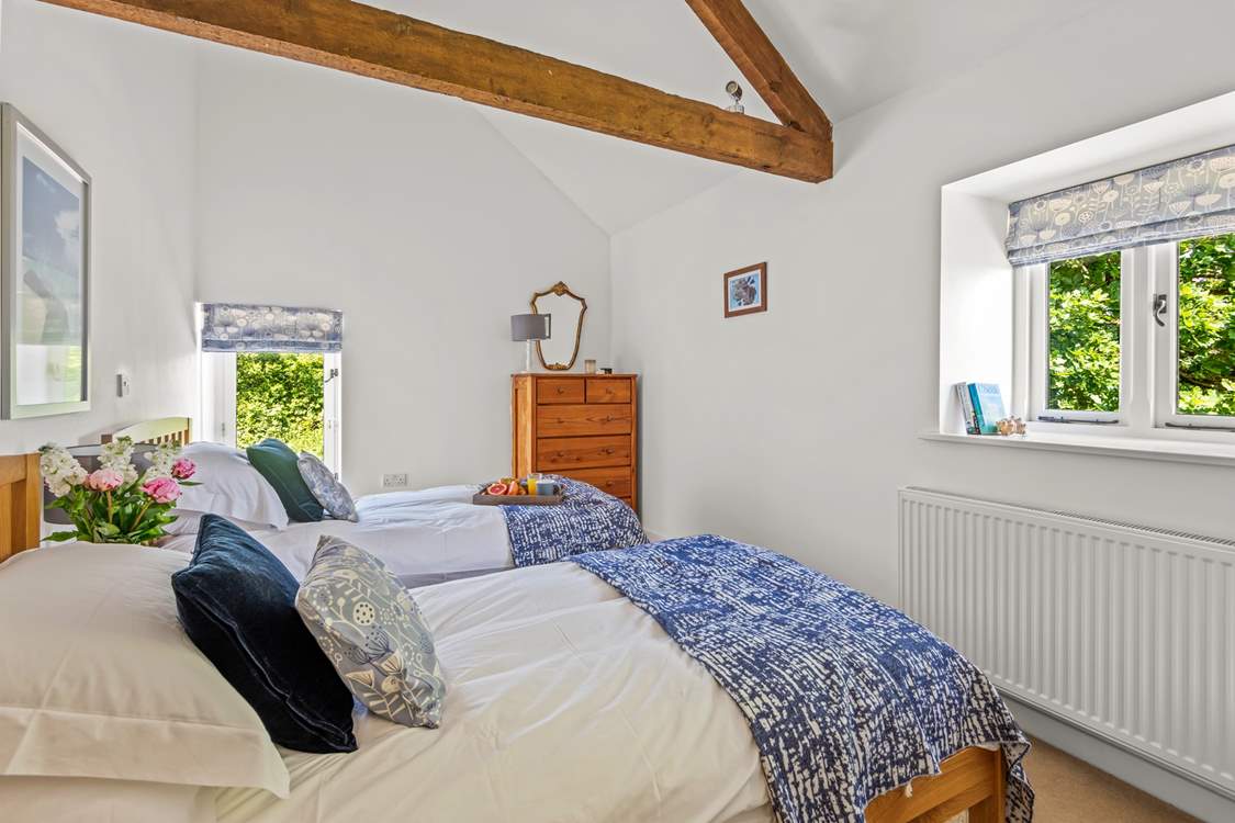 Bedroom 4 offers this beautiful twin configuration.