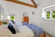 Bedroom 4 offers this beautiful twin configuration.