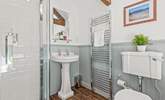 The family bathroom is fully equipped with a shower cubicle and bath. - Thumbnail Image