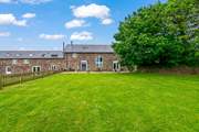 Looking back at Tembridge House from the end of the lawn.
