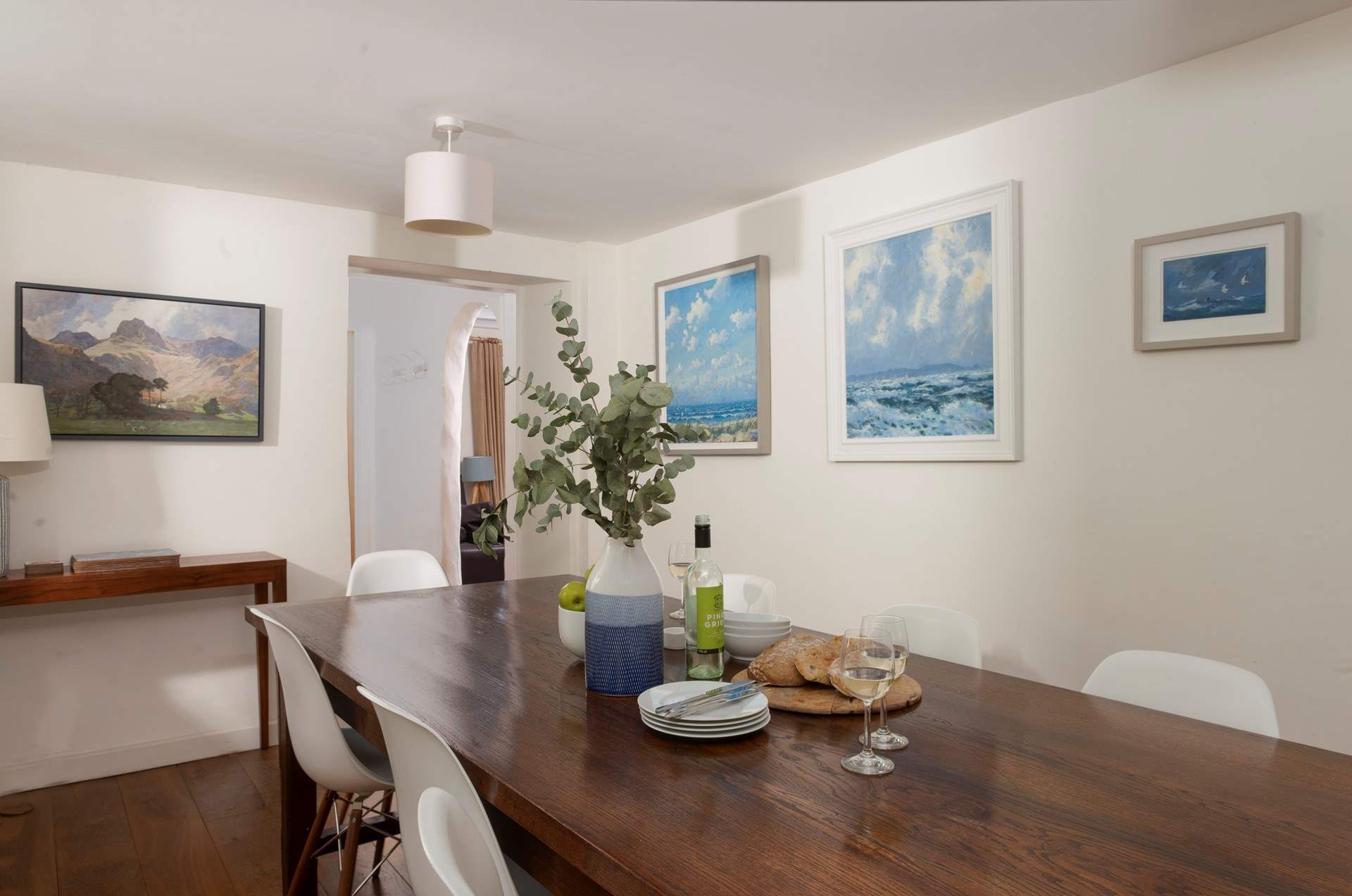 Landscape paintings evoke a sense of serenity.